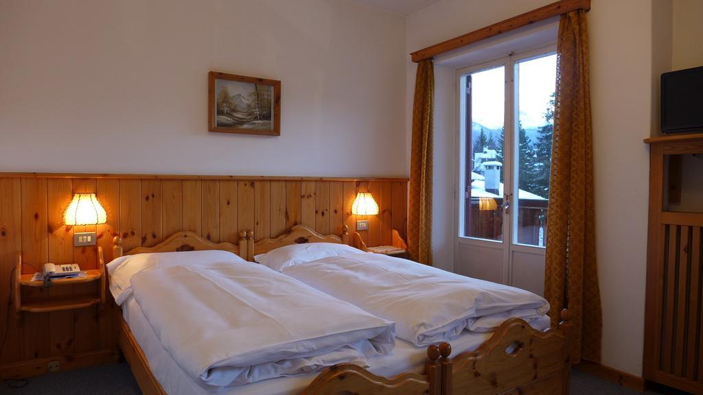 Hotel Bellaria - Кортина д'Ампецо Стая снимка